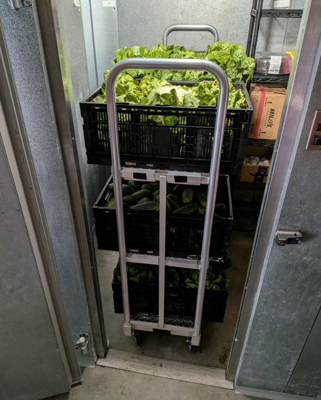 Refrigerated storage filled with donated fresh produce
